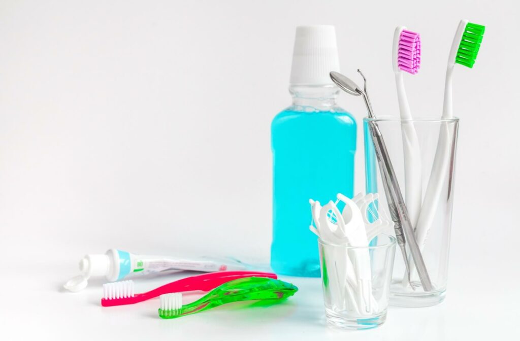 Various oral hygiene tools are on display, from toothbrushes to dental floss to mouthwash.